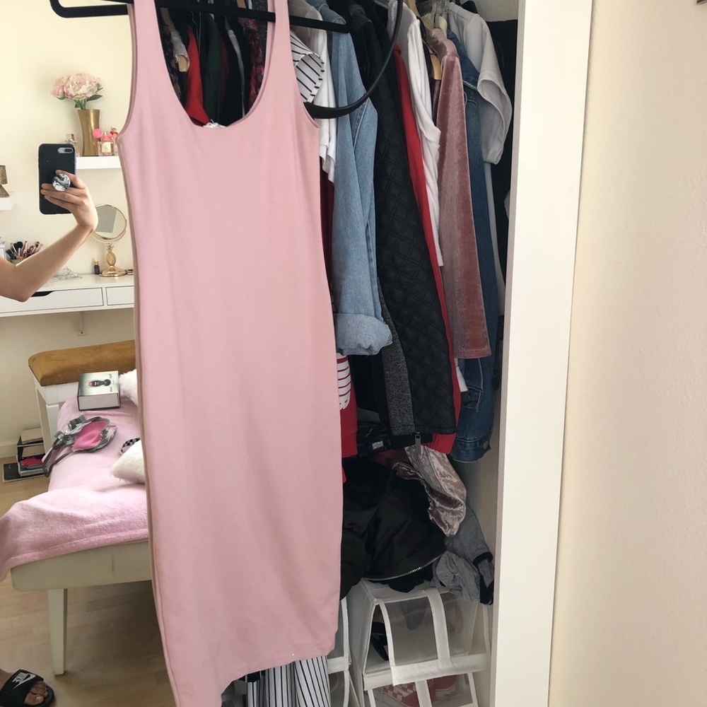 Baby pink tight body con dress